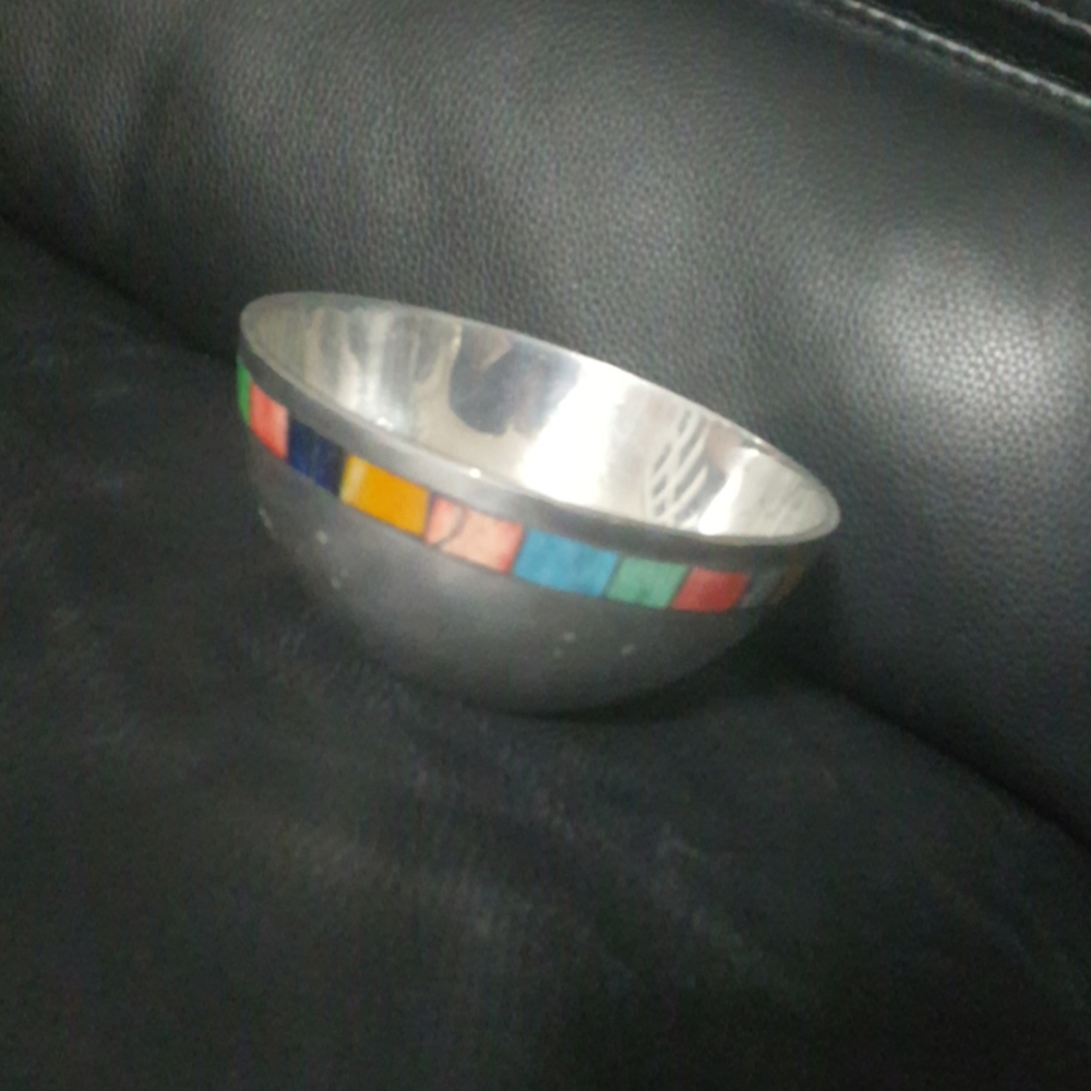 South coast Silver tone bowl. Trimmed in color